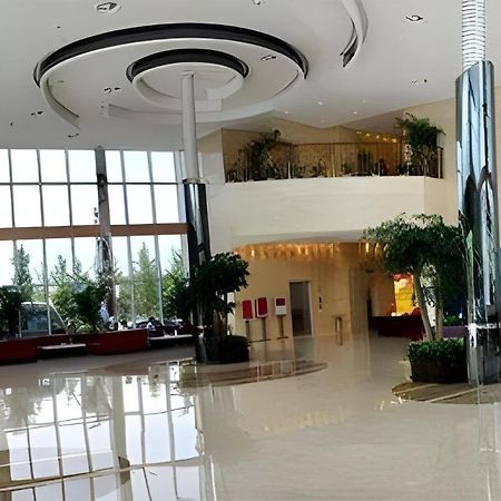 Отель Ramada Plaza By Wyndham Hangzhou Riverside Экстерьер фото